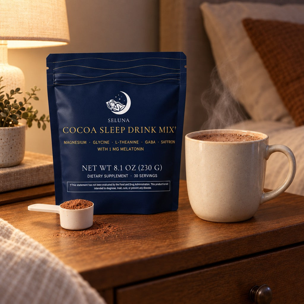Seluna Cocoa Sleep Drink Mix stand-up pouch with a plastic scoop of cocoa and a mug of hot cocoa