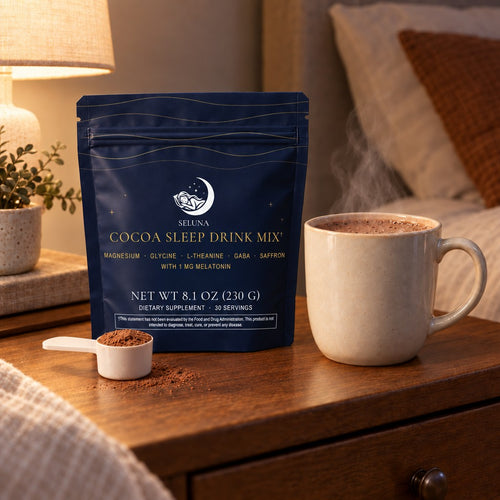 Seluna Cocoa Sleep Drink Mix stand-up pouch with a plastic scoop of cocoa and a mug of hot cocoa