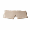 Seluna champagne mulberry silk sleep mask laid flat on white