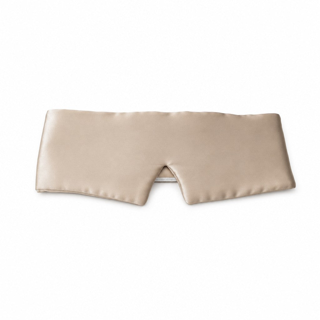 Seluna champagne mulberry silk sleep mask laid flat on white