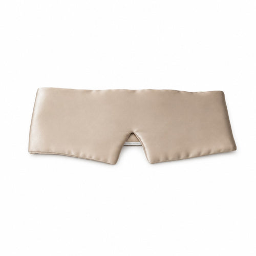 Seluna champagne mulberry silk sleep mask laid flat on white